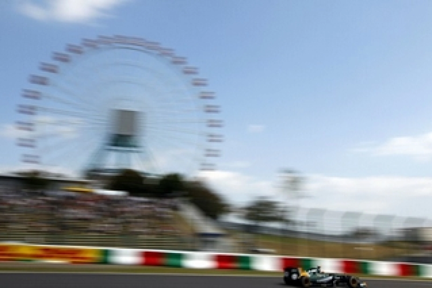 Kovalainen and Petrov under the charm of Suzuka