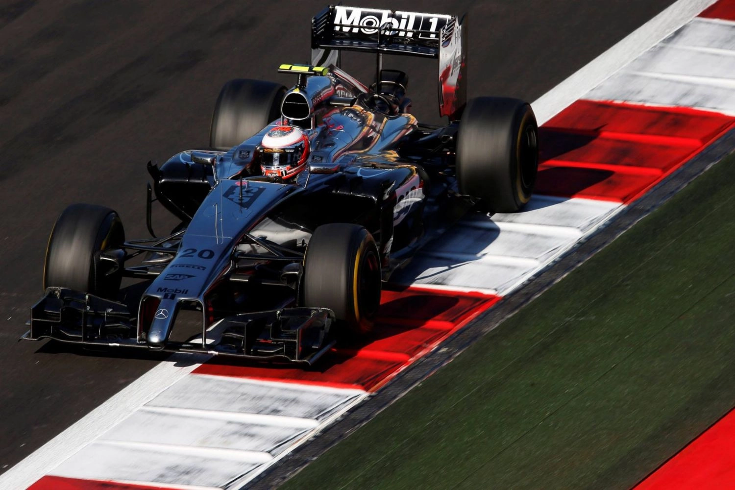 Sunday: Button and Magnussen finish just off the podium for McLaren in Sochi