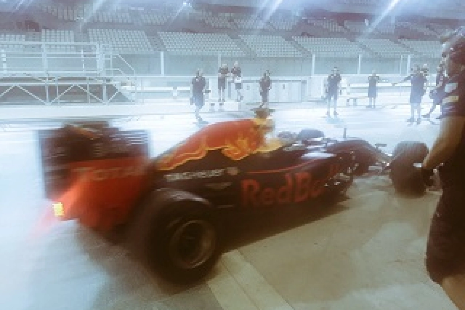 Pierre Gasly aboard the Red Bull in Abu Dhabi to test 2017 rain tires